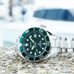 Automatic 45 mm round green dial Date display Stop seconds hand function Manual winding capacit 24 Jewels